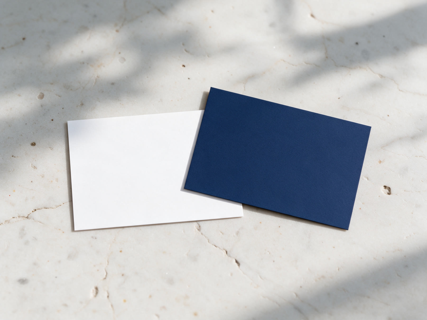 Business cards in white and Navy Concierge