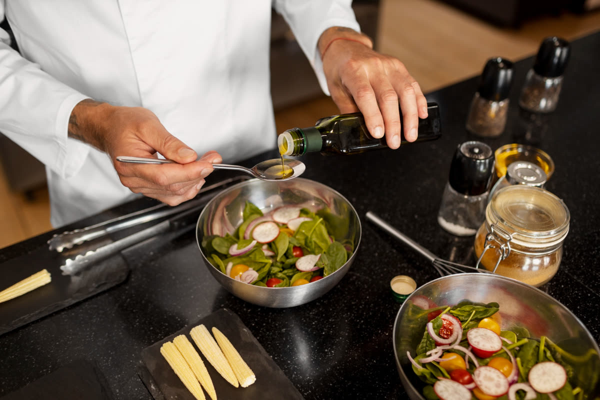 Private chef plating a salad