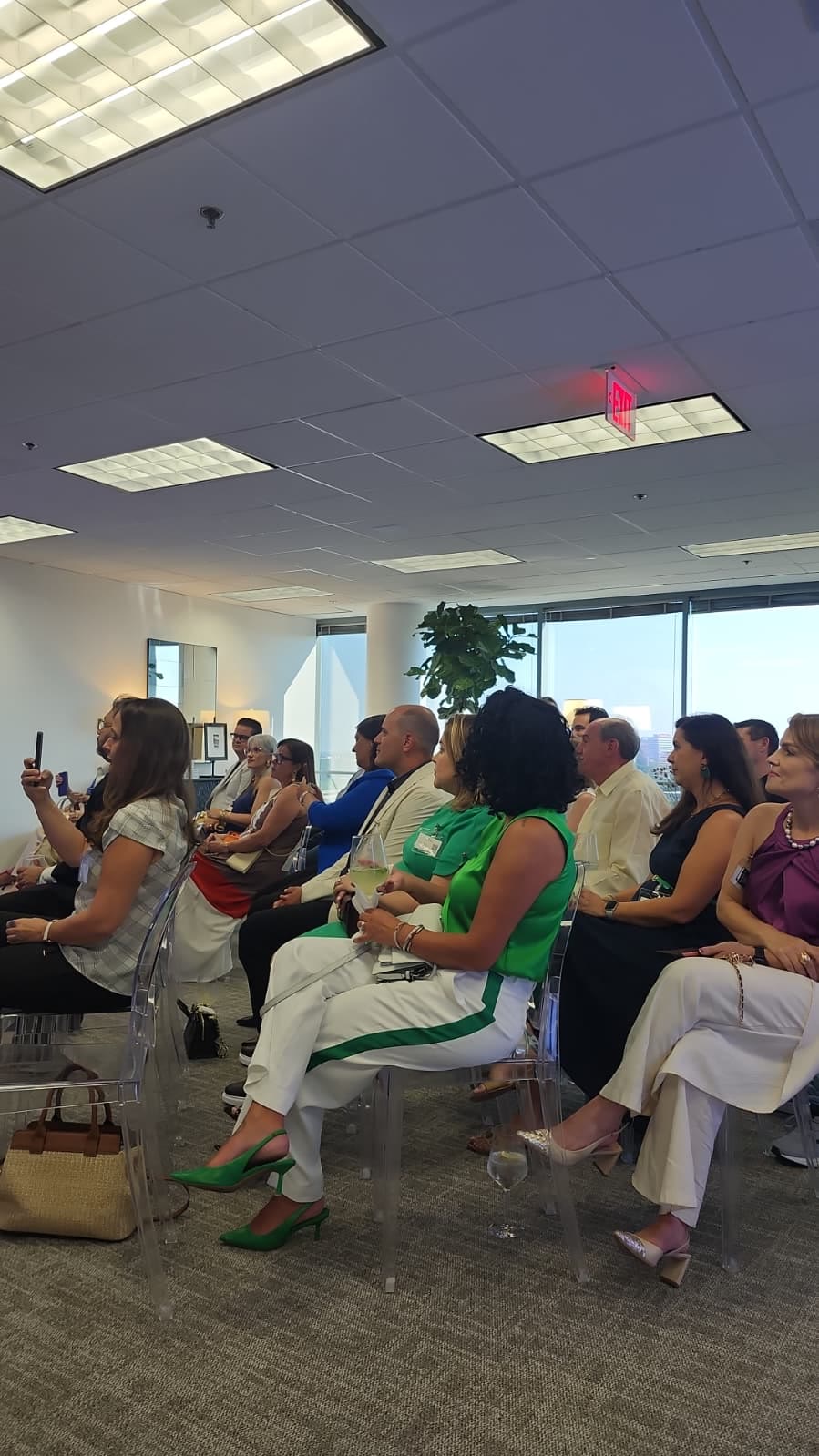 Guests seated in the lounge during a talk